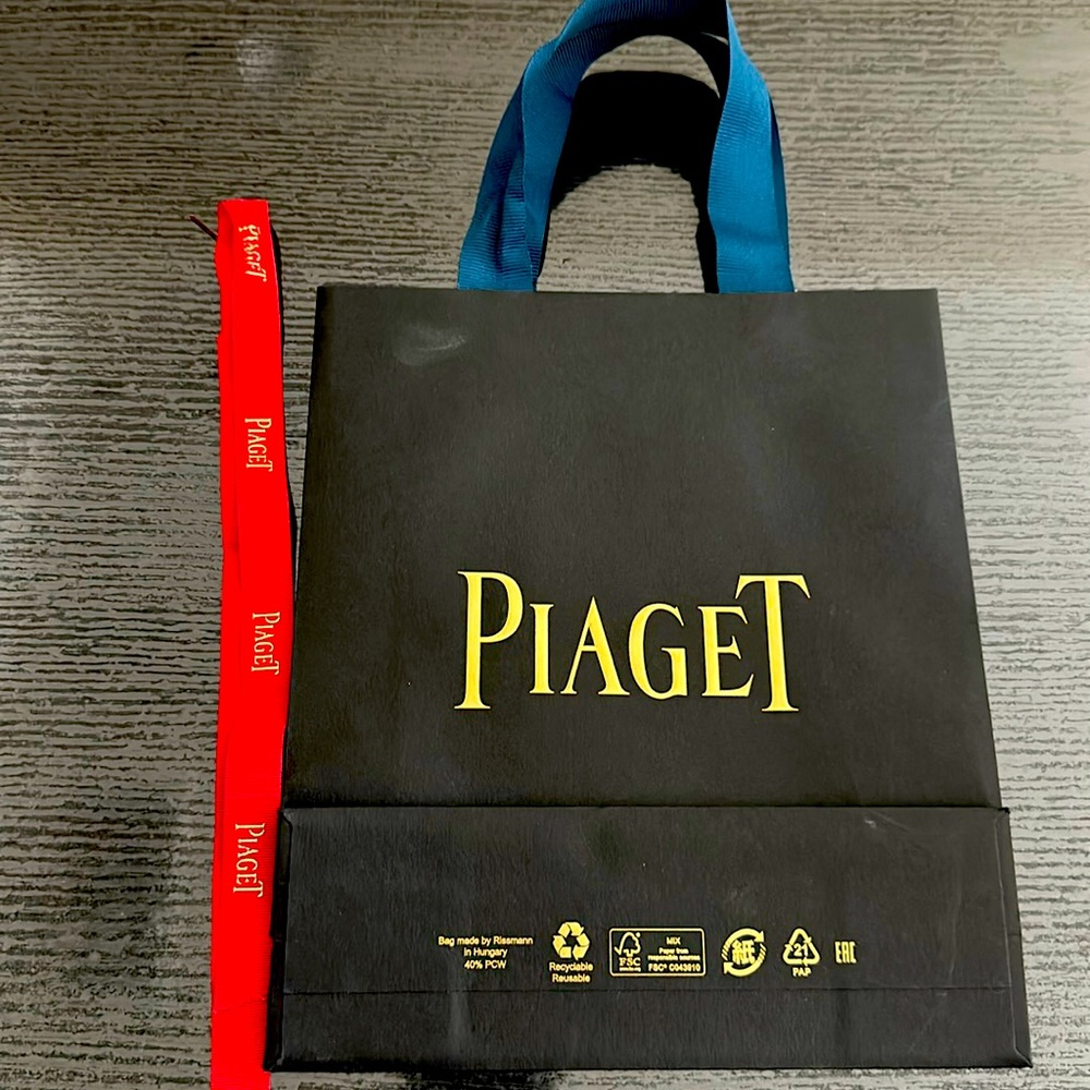Beautiful Piaget bag & red Piaget ribbon.  Fair offers welcome